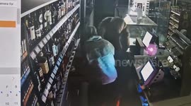 Shocking video shows moment thieves steal cigarettes and tobacco in filling station