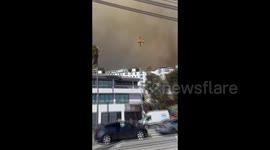 California Wildfire: Palisades Fire Covers LA Sky In Smoke