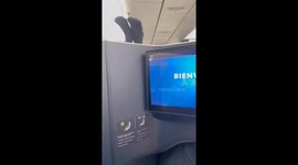 Business class passenger annoys others in cabin by sticking his feet in the air
