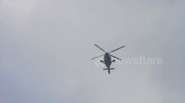 Chinese navy helicopter hovers over Philippine Coast Guard vessel as China's monster ship lingers in Philippine waters