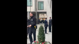 Regent Street Bomb Scare today policewoman shouts for everyone to evacuate quickly from an office