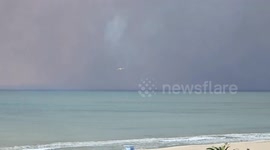 US: Extinguishing of the Palisades fire as seen from Santa Monica