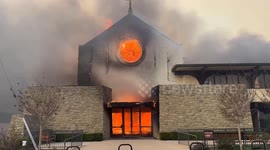 Church in flames and community gutted as Palisades fire continues to grow