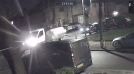 Moment brazen fly-tippers throw fridge from truck onto residential road