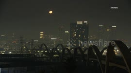 US, Los Angeles: Boyle Heights Smoky Air From Wildfires Turns Moon Orange Over LA