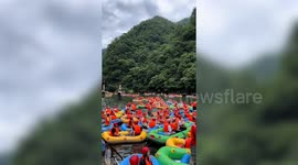 Tourists on rafts cause traffic jam at canyon gates