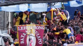 Catholics clamour to touch black Jesus statue at Nazarene festival