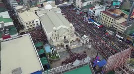 Drone video shows thousands of devotees filling streets for Catholic procession  in the Philippines