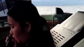 Filipino Coast Guard officers tell Chinese vessel to leave Philippine coastline