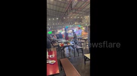 Mass fight erupts when Thai woman's two husbands discover she's seeing a British man
