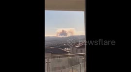 US: Wildfires smoke as seen from San Fernando Valley, LA