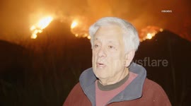 US, Los Angeles: Brentwood Mountain Gate Community Evacuates With Helicopter Water Drops With Sound On Tape