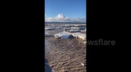 UK: Cold Snap Brings Blocks Of Ice To West Kirby Beach