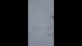 Snowboarding in the Ribble Valley UK. UK recent snowstorm a snowboarder takes advantage and snowboards