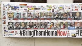 Israel-Hamas War: Overview of the banner with the faces of Jews kidnapped by Hamas in the attack of October 7, 2023 with the slogan ‘Bring them home now’ displayed on one of the facades of the Jewish school in the Jewish Ghetto in Rome.