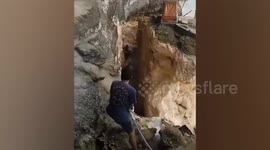 Tourist trapped in landslide rescued in Bali, Indonesia