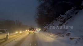 Heavy snow blankets roads causing slippery conditions in Cottonwood Canyons