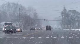 Heavy snow blankets roads in New York
