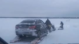 Siberian locals accused of endangering lives with makeshift car sledges