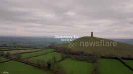 A one-minute video capturing a glimpse of the sun rising over Glastonbury Tor, just before the clouds reclaimed the sky.