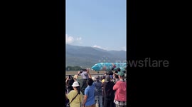 Plane with a 'Frozen' livery entertains locals at Children's Day in Thailand