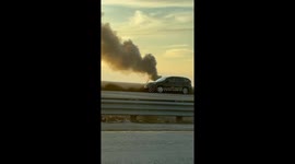 Engine Fire Engulfs Downed Helicopter