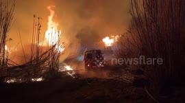 Firemen tackles flames moving towards Ventura County in California