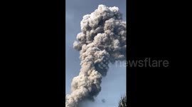 Mount Ibu volcano erupts sending column of ash skywards in Indonesia