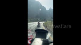 Pensioner cruises along highway on mobility scooter holding up traffic