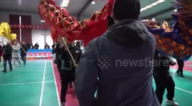 People in China's Xinjiang rehearse Shehuo performances for Spring Festival celebrations