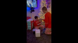 Heartwarming moment as man gives younger brother a matching chain for Christmas