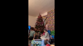Woman delighted to find an engagement ring as her Christmas present