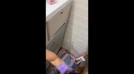 Young Chinese girl effortlessly picks lock with hairpin