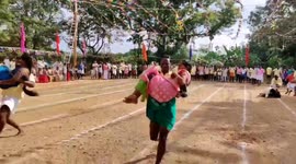 An interesting wife carrying competition was held for the newlyweds in South India on the occasion of harvest festival (pongal)