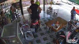 Bungling tourist riding rented motorcycle crashes into roadside restaurant