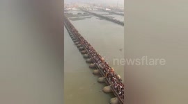 Millions of Hindu followers converge for holy dip ritual in India