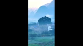 Foggy landscape resembles Chinese ink painting