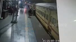 Station guards save two passengers stuck in gap between platform and train