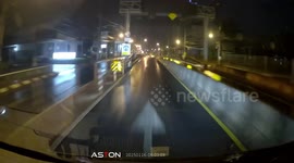 Truck almost hits car driving the wrong way through tunnel