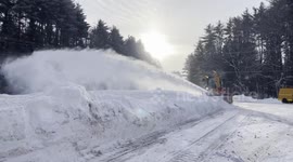 Snow ploughs tackle severe winter weather in New York