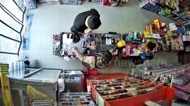 Shopkeeper rushes outside to save elderly woman rolling back on vehicle