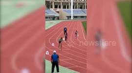 Athletes compete in a 200-metre race on STILTS
