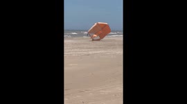 Wind Chaos on the Beach: Lifeguard and Ice Cream Vendor to the Rescue