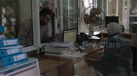 US: Syrians exchange their dollars at the Central Bank of Syria in Damascus