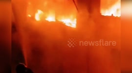 Italy: Massive Fire Engulfs Warehouse in San Miniato, Firefighters Struggle to Contain Blaze