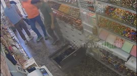 Shocking moment man falls 15 feet down a manhole...