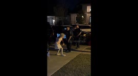 Young Grandma Poses With Police On Halloween
