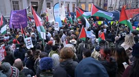 Pro-Palestine protesters gather in Trafalgar Square after the end of the rally in Whitehall, London, UK