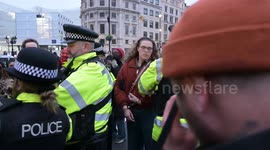 Pro-Palestine protesters gather in Trafalgar Square after the end of the rally in Whitehall, London, UK