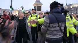 Pro-Palestine protesters gather in Trafalgar Square after the end of the rally in Whitehall, London, UK